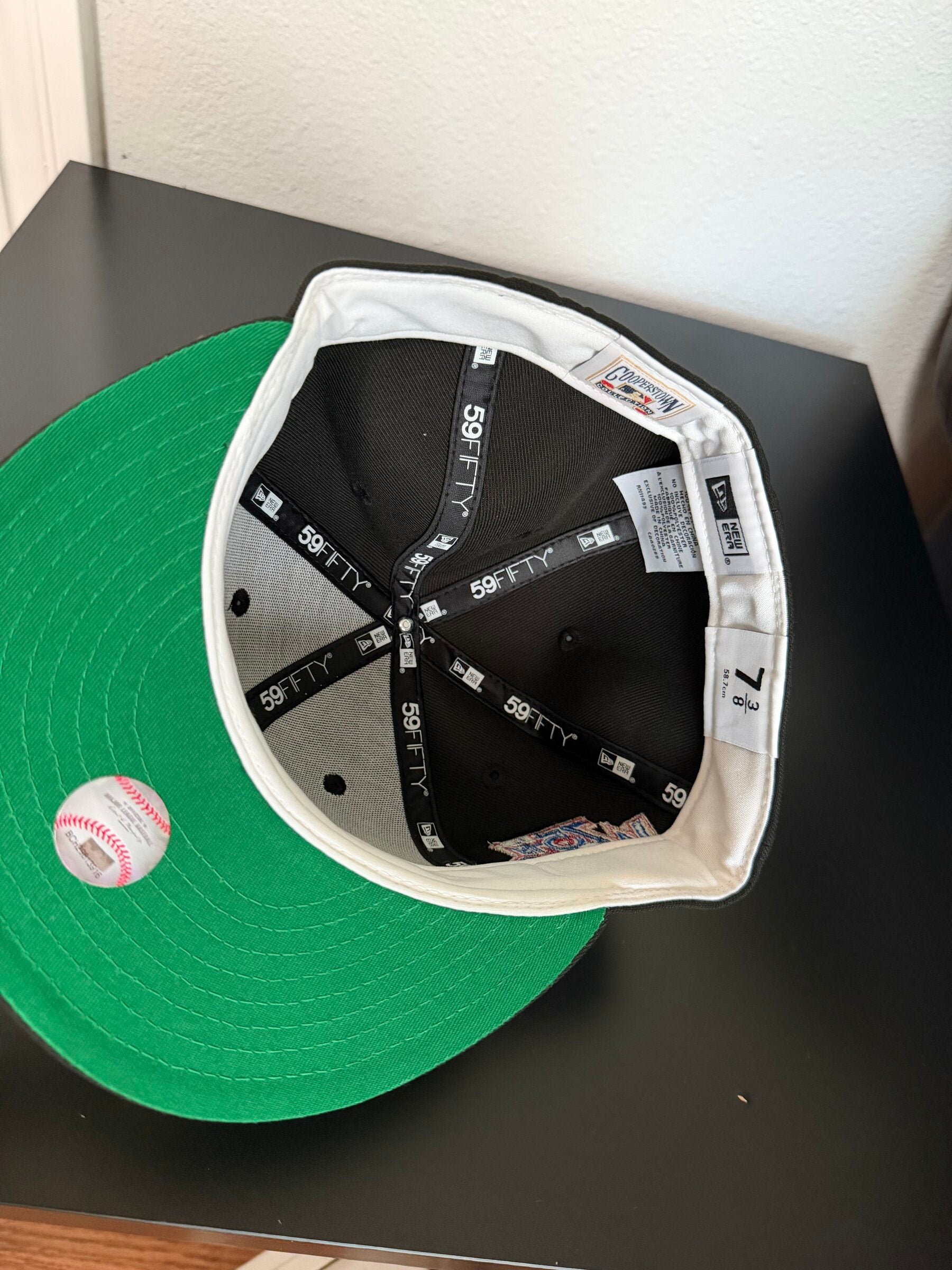 Interior with Cooperstown Collection label and green undervisor, size 7 3/8