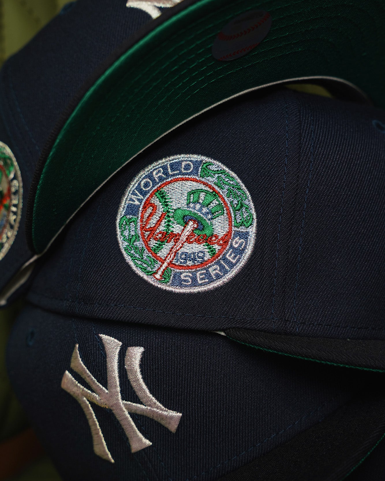 1949 World Series sidepatch detail on navy New Era 59FIFTY with metallic iris embroidery and green undervisor